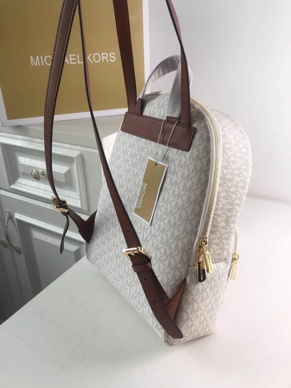 MK Rhea printed studded shoulder bag Model: 2106: Size: 26m Height: 32 Width: 14