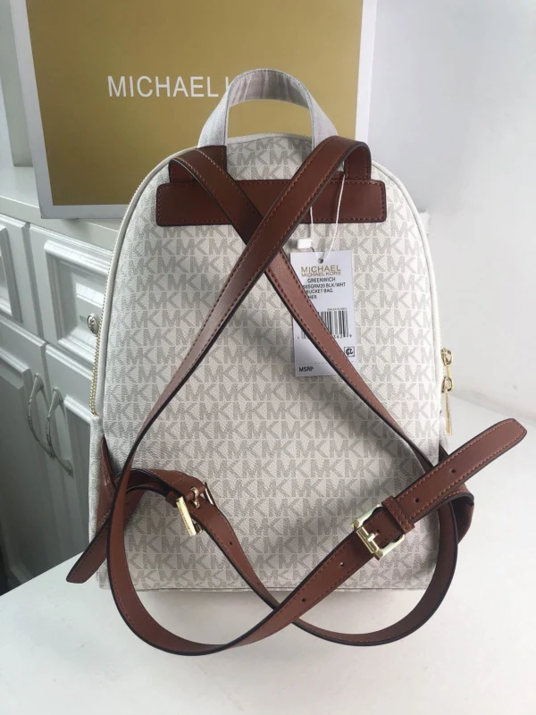 MK Rhea printed studded shoulder bag Model: 2106: Size: 26m Height: 32 Width: 14