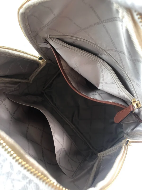 MK Rhea printed studded shoulder bag Model: 2106: Size: 26m Height: 32 Width: 14